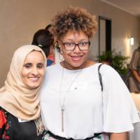 2 women smiling for picture